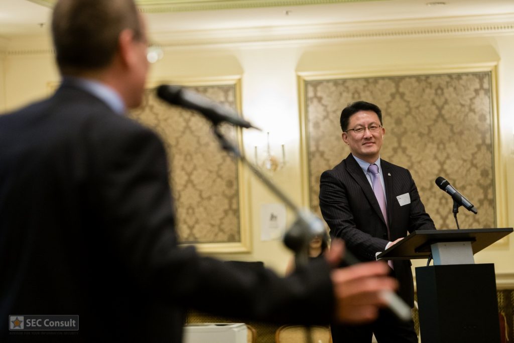 Two people at the lectern - Global cybercrime